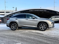 The RX 350 is defined by its "floating roofline" design and the signature Lexus spindle grille. With... (image 1)