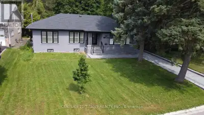 Fantastic, one of a kind, beautifully renovated 3+3 bedroom solid brick Bungalow in a very prestigio...