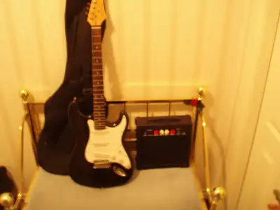 ELECTRIC GUITAR AND AMPLIFIER  ( GOOD CONDITION ), View more