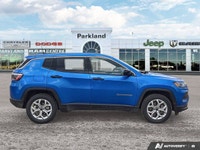 This *2025 Jeep Compass Sport* in striking *Laser Blue Pearl* delivers the perfect balance of capabi... (image 5)