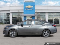 Navigate cityscapes with confidence in this sophisticated former daily rental 2024 Nissan Versa SV.... (image 1)