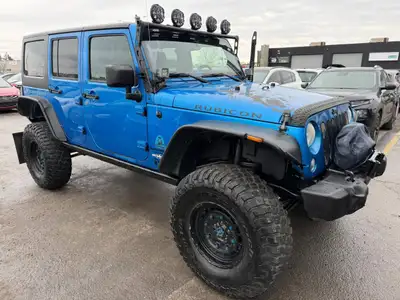2014 JEEP Wrangler 4MK Auto 514 865 4438 2014 Jeep Wrangler Unlimited Rubicon 4X4 V6 3.6L - Toit amo...