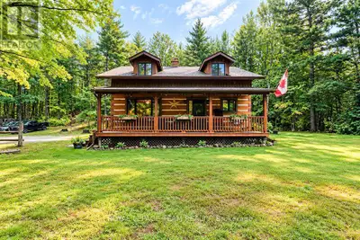 Welcome to this charming 3 bedroom log home, where a large covered front porch welcomes you to your...