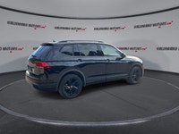 This Volkswagen Tiguan has a strong Turbo Gas 4cyl 2.0 L engine powering this Automatic transmission... (image 7)