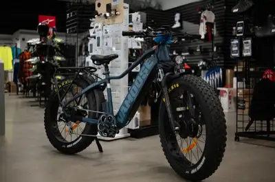 This Vamoose Mammoth Xi 500 AWD electric bicycle comes with dual 52V 500W motors (front and rear), t...