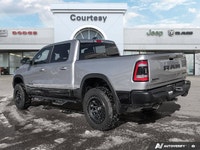 Dominate every road and task in this robust 2021 Ram 1500 Rebel Crew Cab Pickup. Dressed in striking... (image 3)
