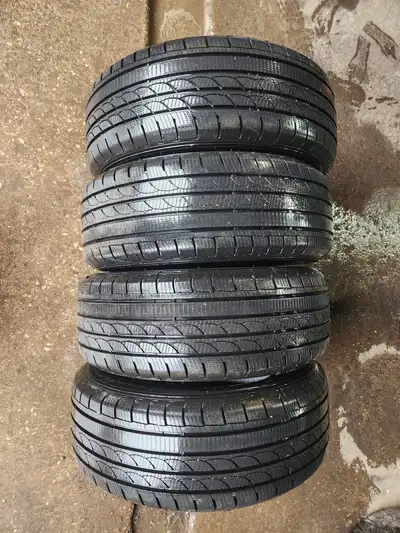 235 60 17 Tracmax Ice-Plus S210 Tread Depth 10 10 9 9 / 32nds DOT 2624 LIKE NEW $450 for the set of...