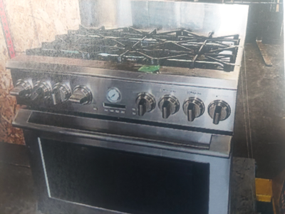 Kenmore 6 burner gas stove top with electic oven. Unit has been in storage. Was purchased for restau...
