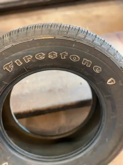 P275/65/r18 Firestone destination with 8/32 tread. $50 firm