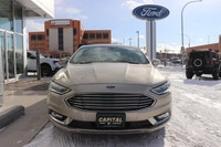 Capital Ford Lincoln Winnipeg Ltd (MB's #1 Rated Ford Store) This WHITE GOLD AWD Fusion Titanium res... (image 1)