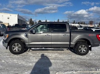 Built to tackle any challenge with unwavering confidence, this 2021 Ford F-150 Crew Cab Pickup is re... (image 1)