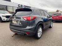 This 2015 Mazda CX-5 GT AWD is a sporty crossover that's smoother than a twisty backroad and comfier... (image 3)