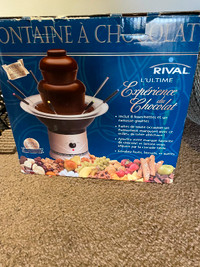Chocolate fountain with metal serving forks