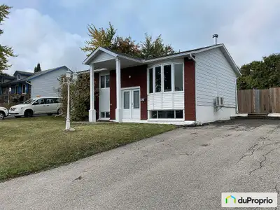 Charmant duplex dans le quartier Mont-Luc, à Gatineau, offrant un excellent potentiel de revenus! Bi...