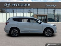 Wrapped in a stunning Quartz White, this 2022 Hyundai Santa Fe Ultimate Calligraphy offers a journey... (image 5)