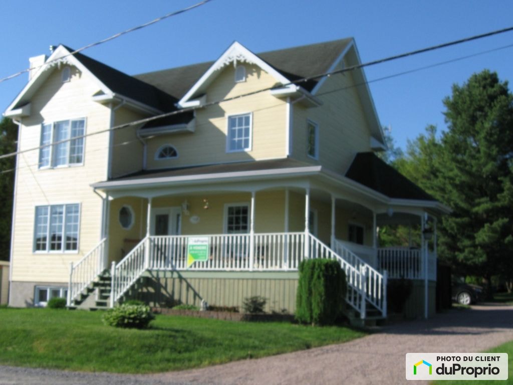 $595,000 - 2 Storey for sale in Jonquière (Lac-Kénogami) — photo 1