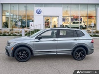 The 2024 Volkswagen Tiguan Comfortline R-Line Black Edition elevates every journey with its distinct... (image 1)