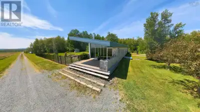 A rare offering unlike anything else on the market, this extraordinary custom-designed home combines...