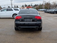 This pre-owned 2008 Audi A4 2.0T offers a timeless design with a sleek black exterior paired with a... (image 4)