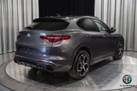 The 2022 Alfa Romeo Stelvio Ti delivers Italian performance and elegance in a stunning SUV package.... (image 4)