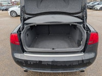 This pre-owned 2008 Audi A4 2.0T offers a timeless design with a sleek black exterior paired with a... (image 5)