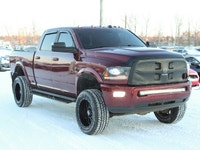 This 2017 Ram 3500 Laramie is a no accidents heavy-duty diesel truck that stands out with a lift kit... (image 6)