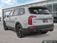 * Nappa leather upholstery * Heated and ventilated front seats * Second-row captain's chairs * 10.25... (image 2)