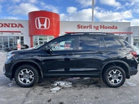 Conquer every adventure with the rugged yet refined 2023 Honda Passport TrailSport, a vehicle engine... (image 7)