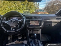 This Volkswagen Tiguan delivers a Intercooled Turbo Regular Unleaded I-4 2.0 L/121 engine powering t... (image 9)