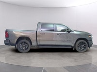 The 2025 Ram 1500 Sport 4x4 Crew Cab in an attractive gray is an impressive blend of power and luxur... (image 5)