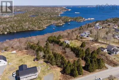 Rare opportunity to own two oceanfront parcels sold together in the sought-after coastal community o...