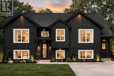 Located in the highly desirable Water’s Edge subdivision, this beautiful two-apartment home is surro...