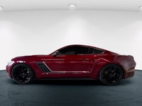 The 2016 Ford Mustang GT in vibrant red with a rear-wheel-drive setup promises dynamic handling and... (image 6)