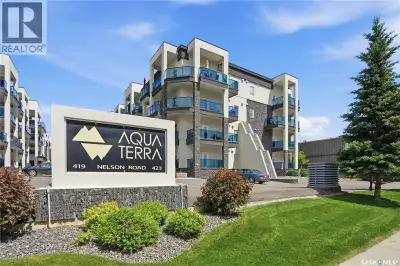 Welcome to #210 at Aqua Terra, 423 Nelson Road, a spacious 2-bedroom, 2-bathroom plus den condo in t...
