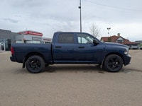 The pre-owned 2021 Ram 1500 Classic Express Crew Cab in Patriot Blue Pearl with a Black and Diesel G... (image 7)