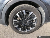 The 2023 Kia Telluride, a commanding presence in Gray, is designed for families seeking superior saf... (image 9)
