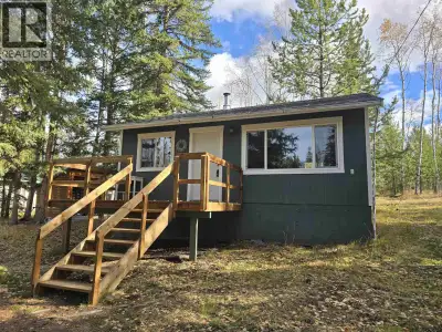 Recently updated cabin right across from private treed public lands with over 700' w/f with a privat...