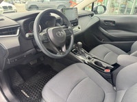 This 2022 Toyota Corolla LE is ready for action from every angle. Sleek J-shaped bi-beam LED headlam... (image 7)