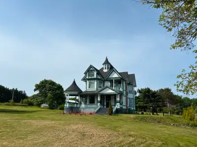 Built in the late 1800?s, this Grand Victorian home sitting on over 6 acres with a beautiful tree li...