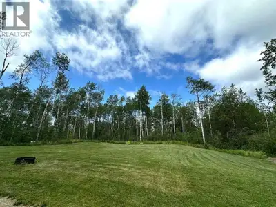 Your own little oasis near Lac Des Iles. Welcome to 605 Loiselle Trail in Meadowlands Subdivison. A...
