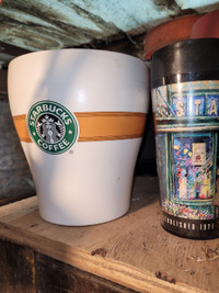 Starbucks canister and travel mug set.
