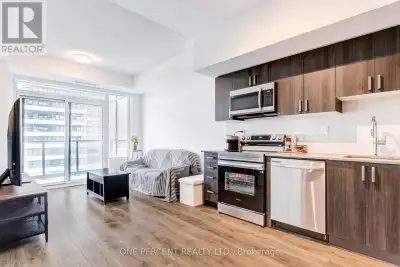 Welcome to Universal City Condos at 1435 Celebration Drive in Bay Ridges! Only 1 year old, this brig...