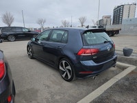 This Volkswagen Golf GTI boasts a Intercooled Turbo Premium Unleaded I-4 2.0 L/121 engine powering t... (image 1)