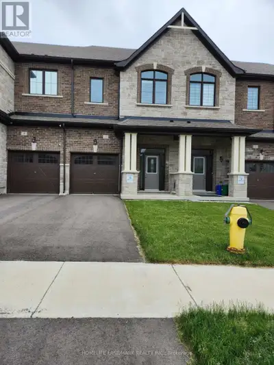 New Front lane Freehold townhome in Sharon Village. 3 Bedroom 2.5 Bath,9Ft Ceilings, Large Kitchen F...