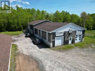 Located just a short drive from essential amenities, this versatile property offers an exciting oppo...