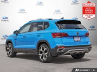 New Price! Odometer is 3459 kilometers below market average! Blue 2023 Volkswagen Taos Highline AWD... (image 2)