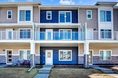 Welcome to 124 Savanna Street NE, a modern 4-bedroom, 3-bathroom townhouse in the vibrant community...