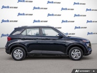Discover the 2020 Hyundai Venue Preferred: a sleek, black subcompact SUV designed for urban adventur... (image 5)