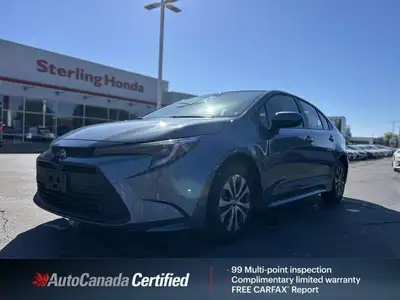Experience remarkable fuel efficiency and peace of mind with this pristine 2024 Toyota Corolla Hybri...