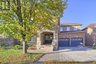 Welcome to this completely renovated showpiece, offering almost 5000 sq ft of luxurious living space...